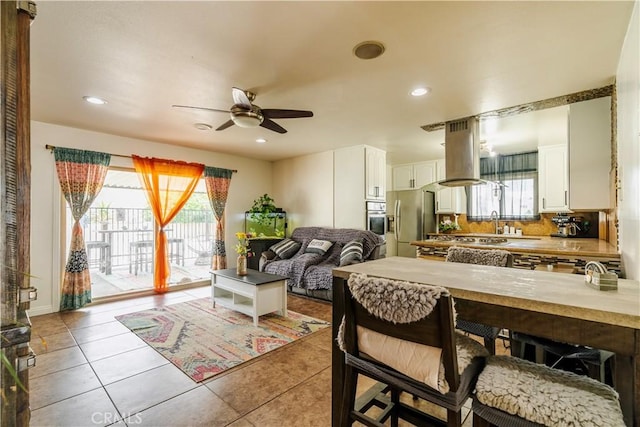 19264 Casmalia St, Rialto, CA 92377 - living area featuring ceiling fan, tile patterned flooring, and recessed lighting