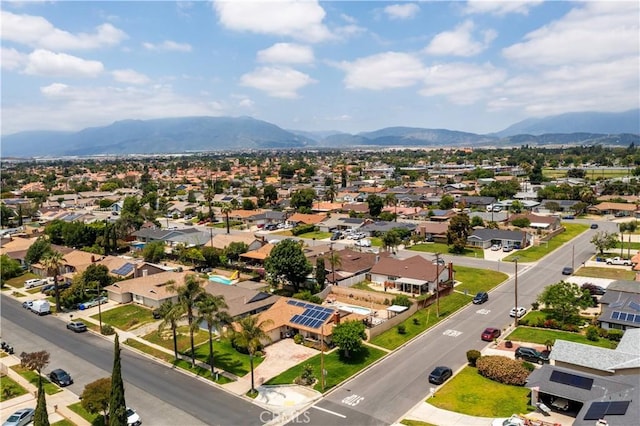 19264 Casmalia St, Rialto, CA 92377 - aerial perspective of suburban area featuring a mountainous background