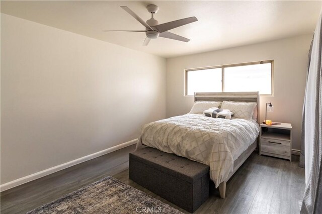 19264 Casmalia St, Rialto, CA 92377 - bedroom featuring dark wood finished floors, baseboards, and a ceiling fan