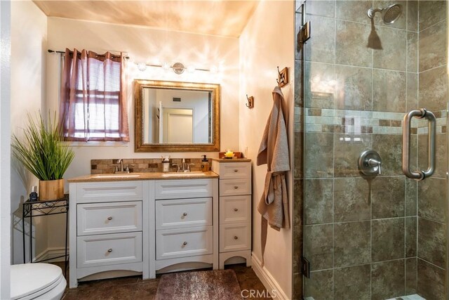 19264 Casmalia St, Rialto, CA 92377 - full bath featuring a stall shower, double vanity, and toilet