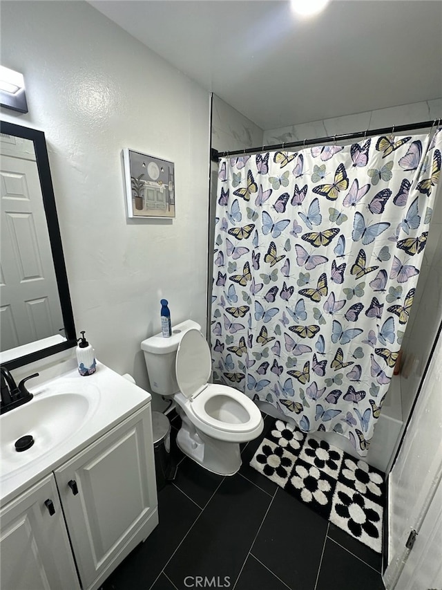 1451 W 146th St, Gardena, CA 90247 - bathroom with vanity, toilet, tile patterned floors, and shower / bathtub combination with curtain
