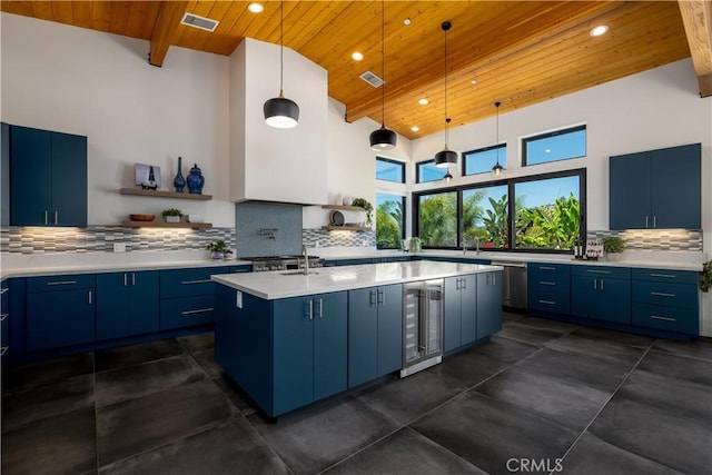 1088 Via Conca Doro, Vista, CA 92084 - kitchen featuring blue cabinets, wooden ceiling, beverage cooler, open shelves, and stainless steel dishwasher
