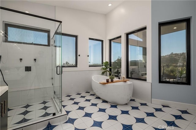 1088 Via Conca Doro, Vista, CA 92084 - full bathroom with a freestanding tub, a stall shower, vanity, tile patterned floors, and recessed lighting