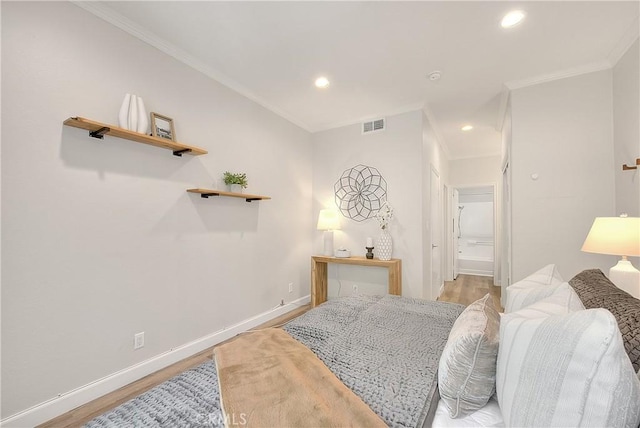 bedroom featuring wood finished floors, baseboards, ornamental molding, and recessed lighting