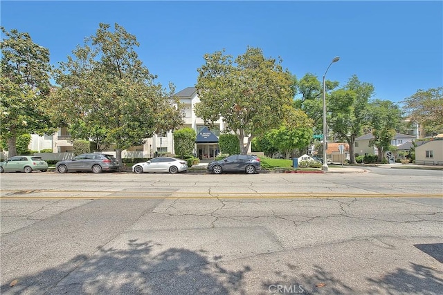 300 N El Molino Ave Unit 118, Pasadena, CA 91101 - view of asphalt road featuring street lighting and a residential view