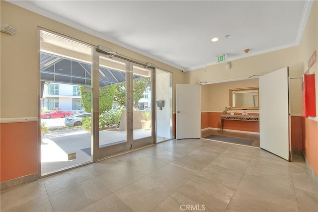 spare room with ornamental molding, baseboards, tile patterned flooring, and recessed lighting