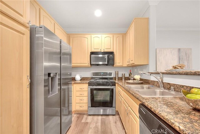300 N El Molino Ave Unit 118, Pasadena, CA 91101 - kitchen with appliances with stainless steel finishes, a sink, light brown cabinets, and ornamental molding