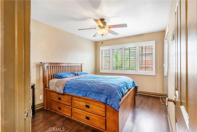 330 E Gladstone St, San Dimas, CA 91773 - bedroom featuring dark wood finished floors, baseboards, and a ceiling fan