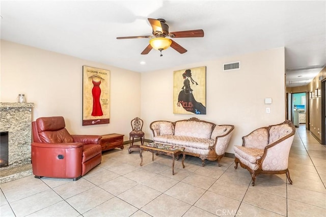 330 E Gladstone St, San Dimas, CA 91773 - living area featuring light tile patterned flooring, a ceiling fan, and baseboards