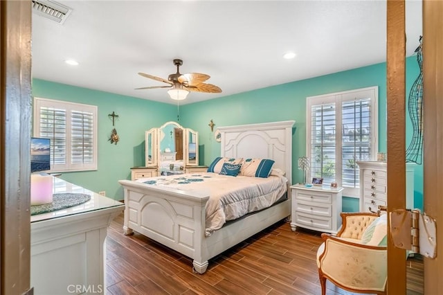 330 E Gladstone St, San Dimas, CA 91773 - bedroom with multiple windows, dark wood-style floors, recessed lighting, and ceiling fan