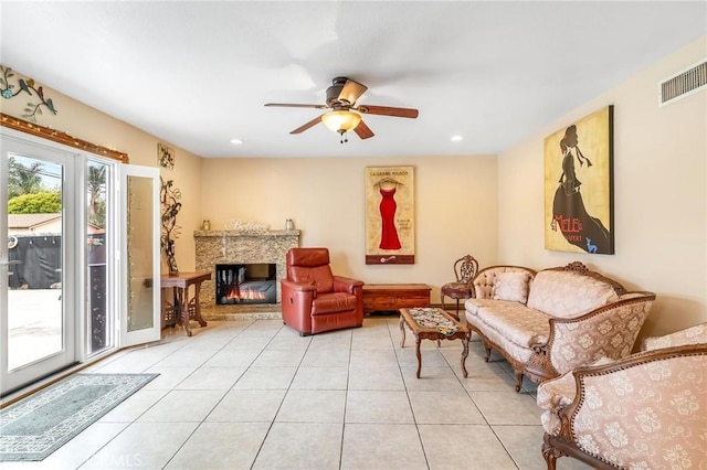 330 E Gladstone St, San Dimas, CA 91773 - living area featuring light tile patterned flooring, a ceiling fan, a glass covered fireplace, and recessed lighting