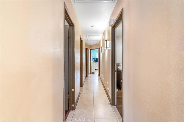 330 E Gladstone St, San Dimas, CA 91773 - hall featuring attic access and light tile patterned floors