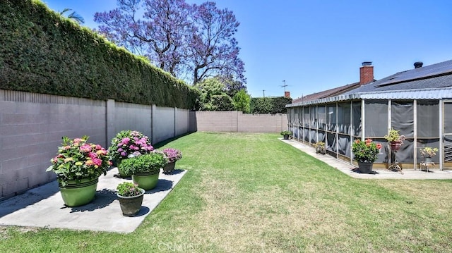 view of yard featuring a sunroom