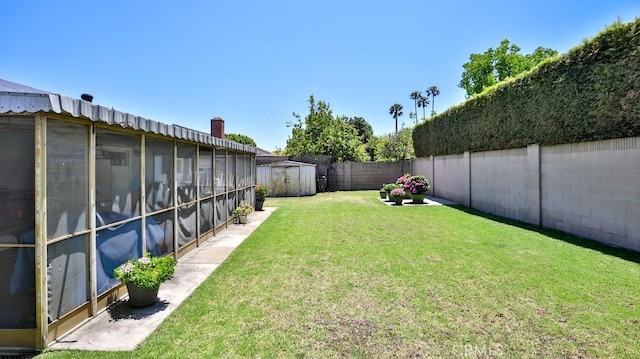 view of yard featuring a sunroom
