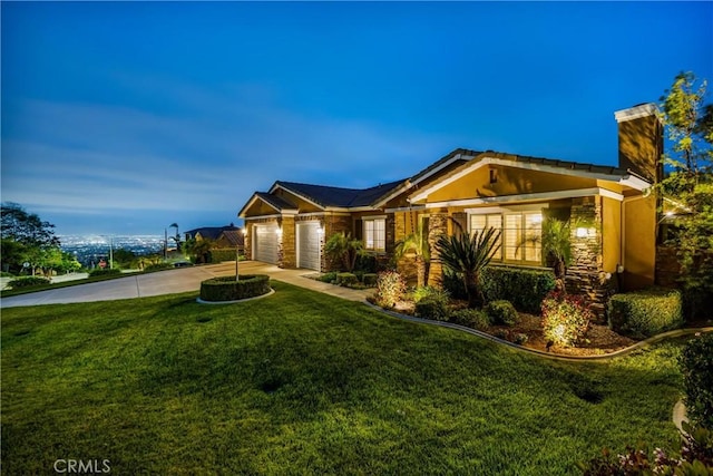 single story home featuring a chimney, a garage, a front yard, driveway, and stucco siding