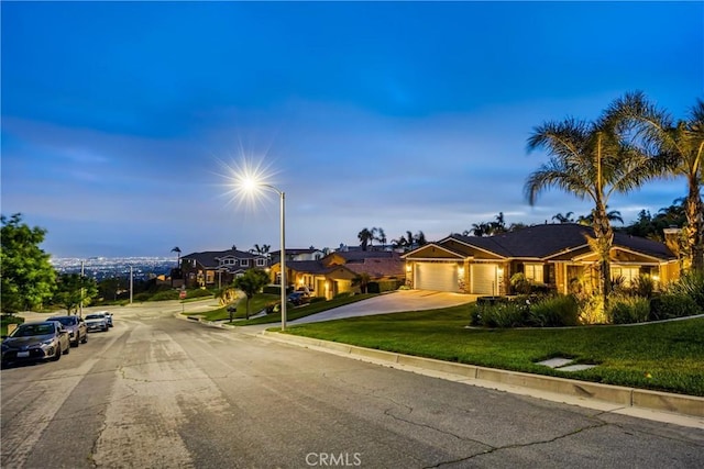 4976 Huntswood Pl, Rancho Cucamonga, CA 91737 - view of front of house featuring an attached garage, a front lawn, driveway, and a residential view