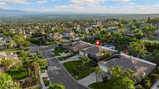 aerial view of property's location with nearby suburban area