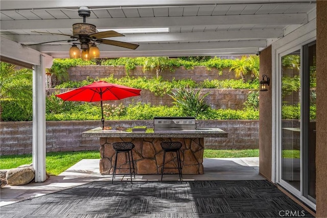 view of patio / terrace with a grill and ceiling fan