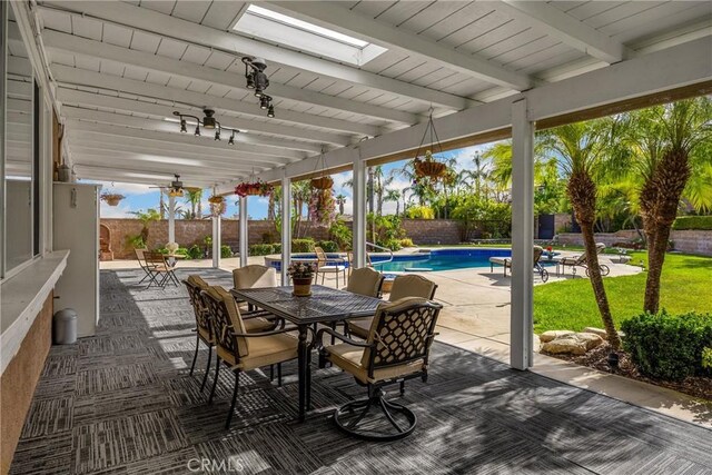 view of patio with outdoor dining space