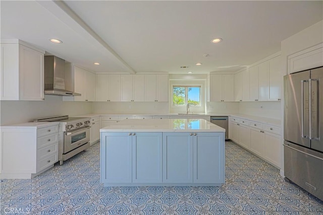 26710 Camino Seco, Temecula, CA 92590 - kitchen with premium appliances, wall chimney exhaust hood, a sink, light countertops, and a center island