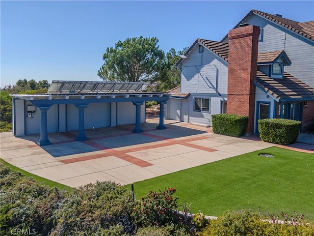 26710 Camino Seco, Temecula, CA 92590 - rear view of property with a chimney, a lawn, and a tiled roof