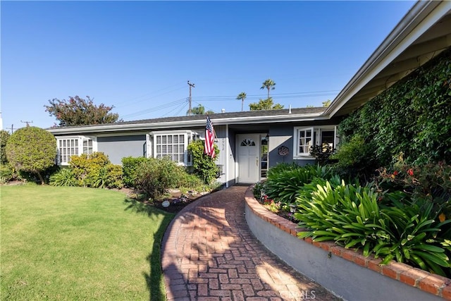2952 Pemba Dr, Costa Mesa, CA 92626 - view of front of home with a front lawn and stucco siding