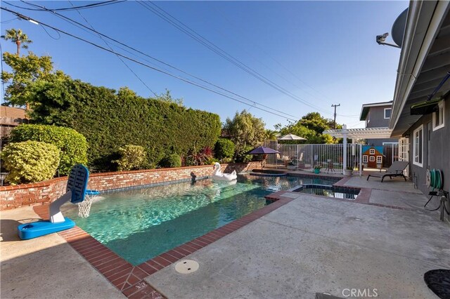 2952 Pemba Dr, Costa Mesa, CA 92626 - view of pool featuring a patio area, a fenced backyard, and a pool with connected hot tub