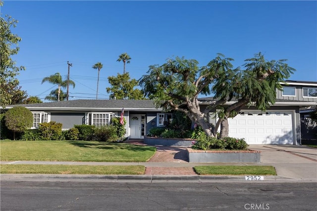 2952 Pemba Dr, Costa Mesa, CA 92626 - view of front of property with driveway, a front yard, and an attached garage