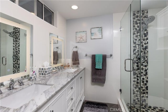 2952 Pemba Dr, Costa Mesa, CA 92626 - bathroom with a stall shower, double vanity, and recessed lighting
