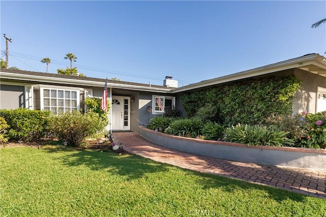 2952 Pemba Dr, Costa Mesa, CA 92626 - ranch-style home featuring a front yard, stucco siding, and a chimney