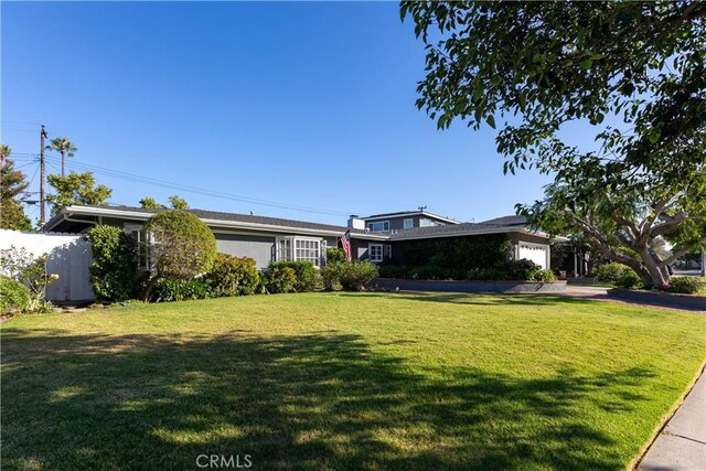 2952 Pemba Dr, Costa Mesa, CA 92626 - view of front of house with a front lawn and a garage
