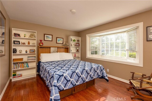 2952 Pemba Dr, Costa Mesa, CA 92626 - bedroom featuring wood finished floors and baseboards
