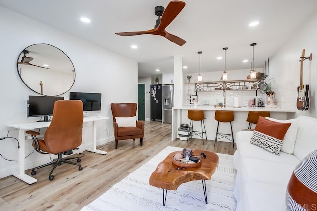 6780 Friars Rd Unit 269, San Diego, CA 92108 - living room with light wood-style flooring, recessed lighting, a desk, a ceiling fan, and baseboards