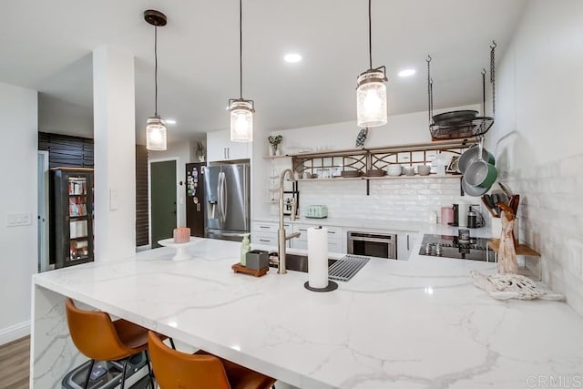 6780 Friars Rd Unit 269, San Diego, CA 92108 - kitchen featuring open shelves, stainless steel refrigerator with ice dispenser, decorative backsplash, a peninsula, and white cabinets