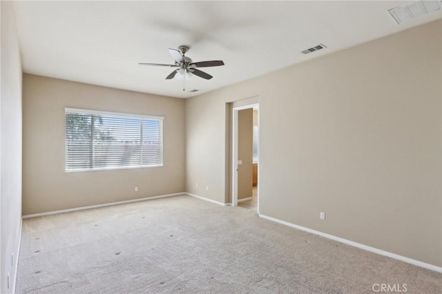 1704 Golden Way, Beaumont, CA 92223 - spare room with ceiling fan, baseboards, and carpet flooring