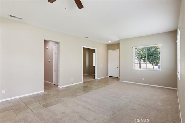1704 Golden Way, Beaumont, CA 92223 - carpeted empty room featuring ceiling fan, baseboards, and tile patterned floors