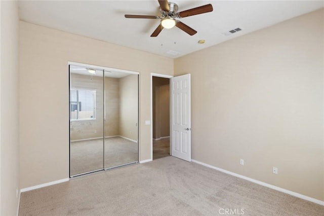 1704 Golden Way, Beaumont, CA 92223 - unfurnished bedroom with carpet, a closet, baseboards, and ceiling fan