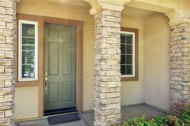1704 Golden Way, Beaumont, CA 92223 - property entrance featuring stone siding and stucco siding