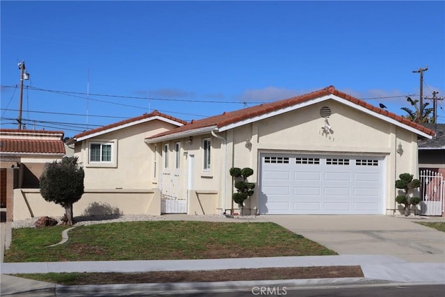 18907 Felbar Ave, Torrance, CA 90504 - single story home with stucco siding, an attached garage, driveway, and a tiled roof