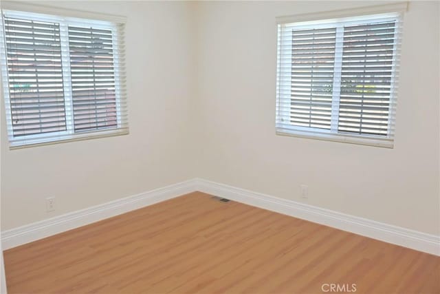 18907 Felbar Ave, Torrance, CA 90504 - empty room with wood finished floors and baseboards