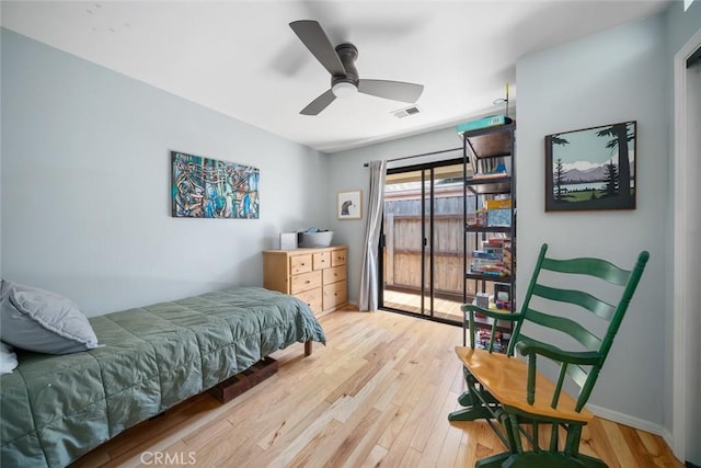 2350 Meadow St, San Luis Obispo, CA 93401 - bedroom with access to exterior, wood finished floors, baseboards, and ceiling fan