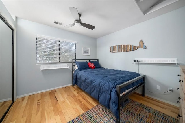 2350 Meadow St, San Luis Obispo, CA 93401 - bedroom with wood finished floors, baseboards, a closet, and a ceiling fan