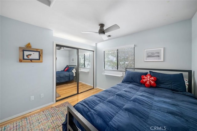 2350 Meadow St, San Luis Obispo, CA 93401 - bedroom featuring wood finished floors, baseboards, a ceiling fan, and a closet