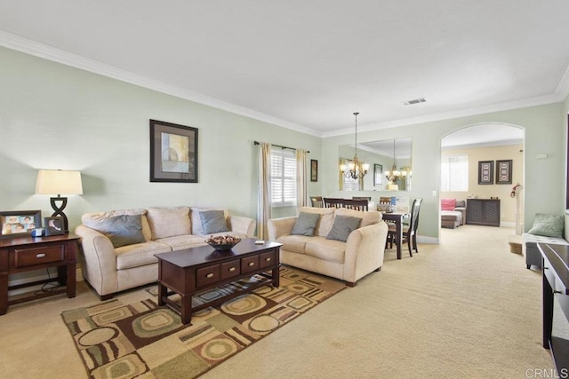 1207 Barton Peak Dr, Chula Vista, CA 91913 - living area featuring carpet flooring, a chandelier, ornamental molding, arched walkways, and baseboards