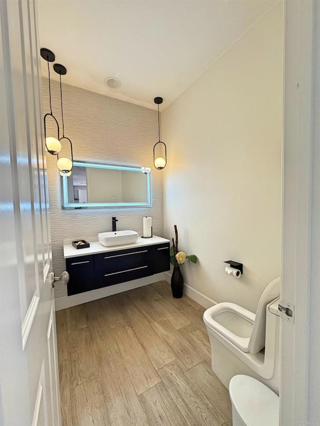 1498 Berry Creek Pl, Chula Vista, CA 91913 - bathroom with vanity, toilet, wood finished floors, and baseboards