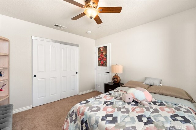 10779 Mills Rd, Apple Valley, CA 92308 - carpeted bedroom with baseboards, a closet, and ceiling fan