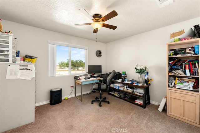 10779 Mills Rd, Apple Valley, CA 92308 - office area with light colored carpet, ceiling fan, baseboards, and a textured ceiling