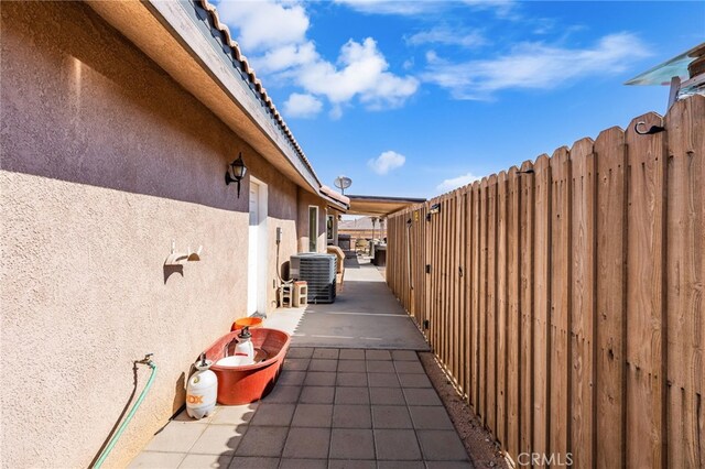 10779 Mills Rd, Apple Valley, CA 92308 - view of patio / terrace with central AC unit