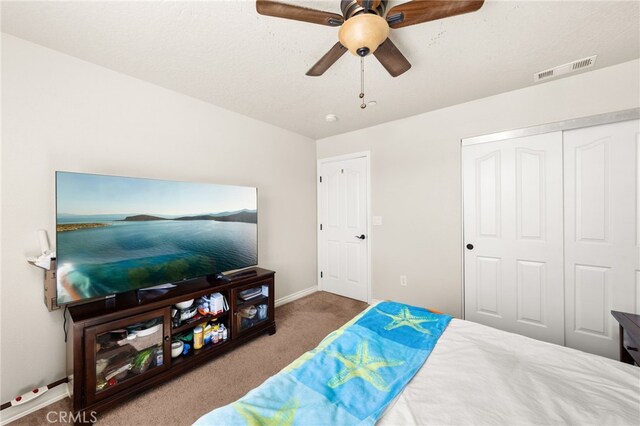 10779 Mills Rd, Apple Valley, CA 92308 - bedroom featuring carpet floors, a closet, baseboards, and ceiling fan