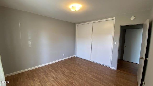 3407 Rexford St, Ventura, CA 93003 - unfurnished bedroom featuring wood finished floors, baseboards, and a closet